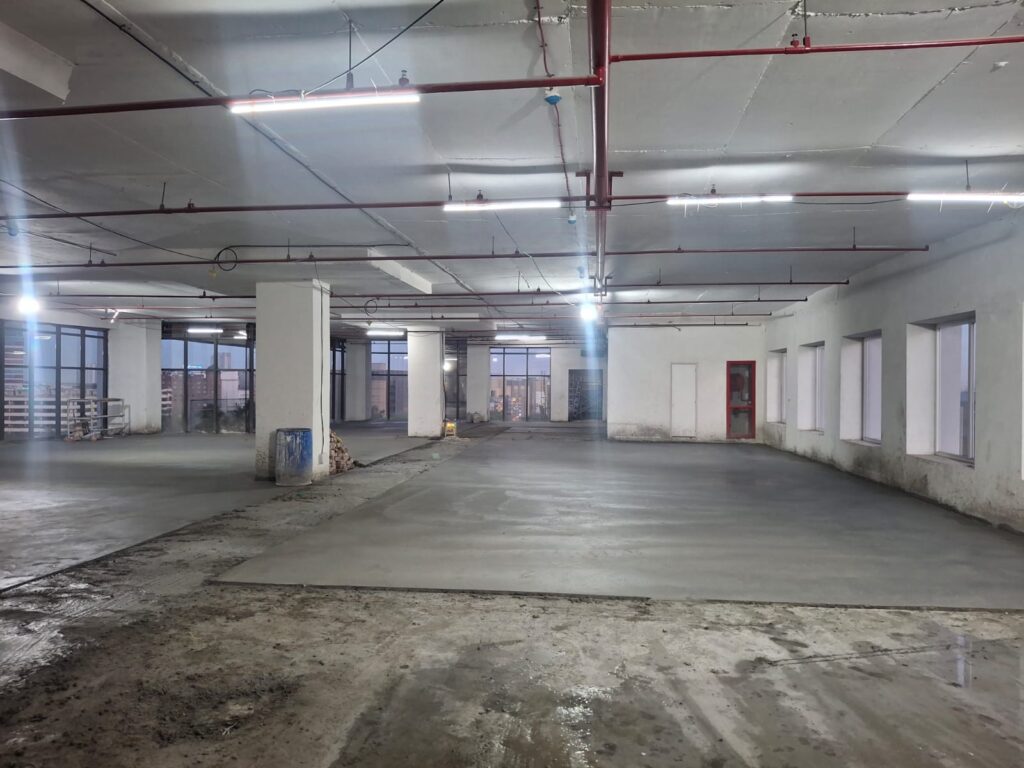 KS Tower Noida Trimix Flooring Project | Swastik Infra Projects whatsapp image 2026 04 19 at 5.21.42 pm